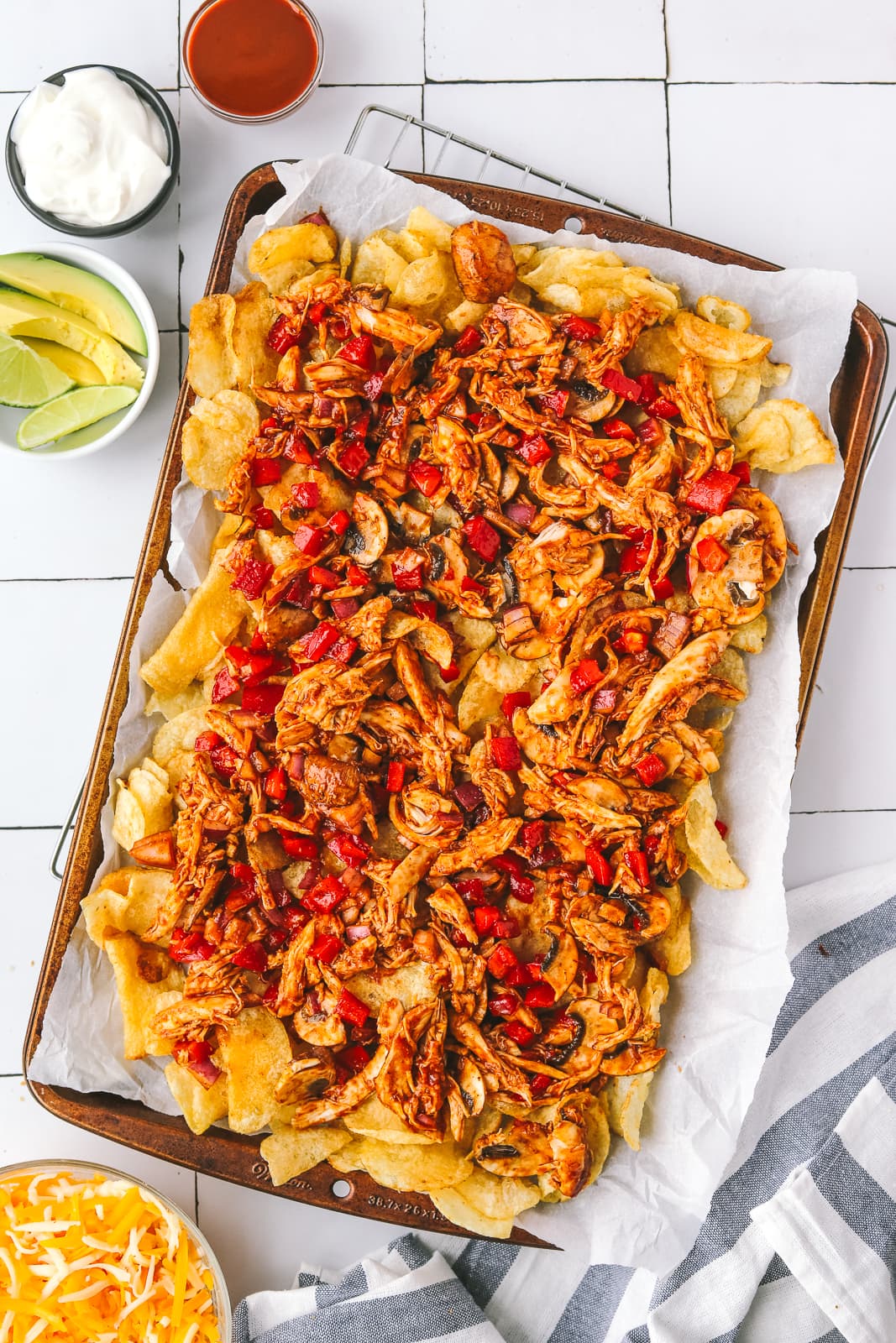 layers of chicken, red pepper on kettle chips