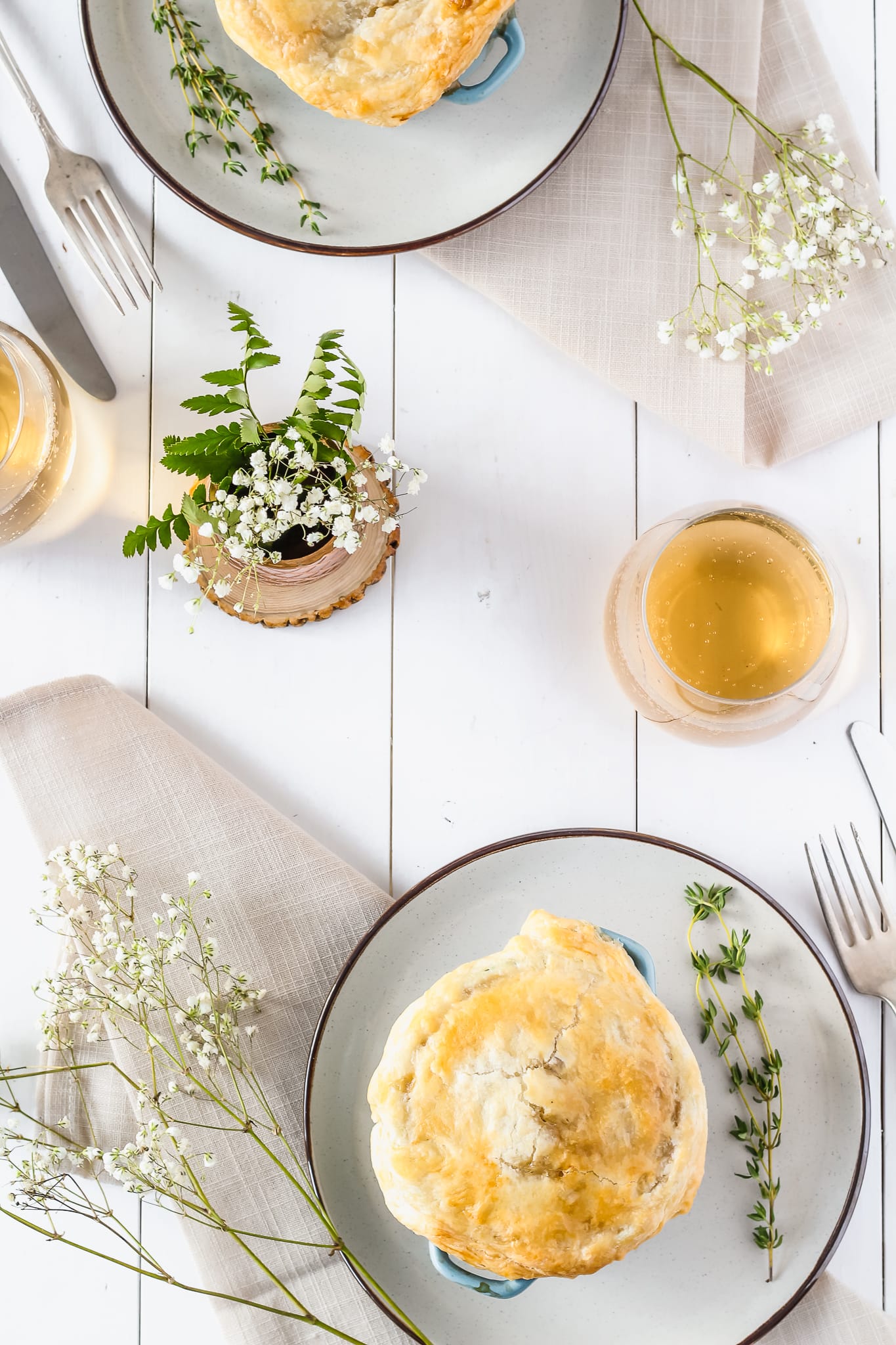 full table setting with pies and wine