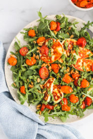 Roasted Tomato, Arugula and Halloumi Salad with Pesto | cookinginmygenes.com
