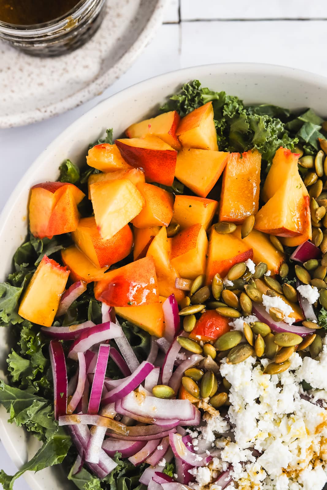 Kale & Peach Salad with Feta and Toasted Pepitas