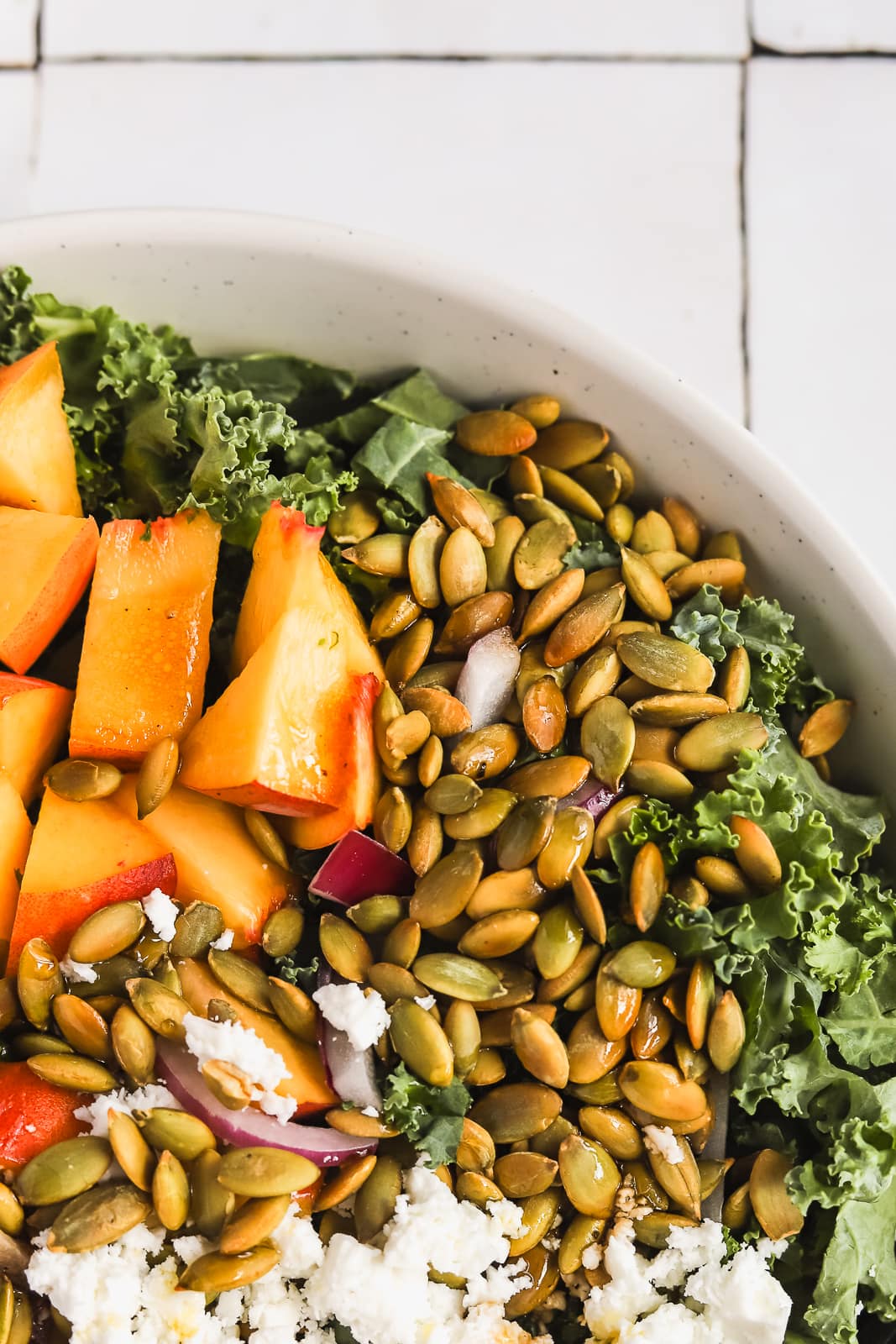 Kale & Peach Salad with Feta and Toasted Pepitas