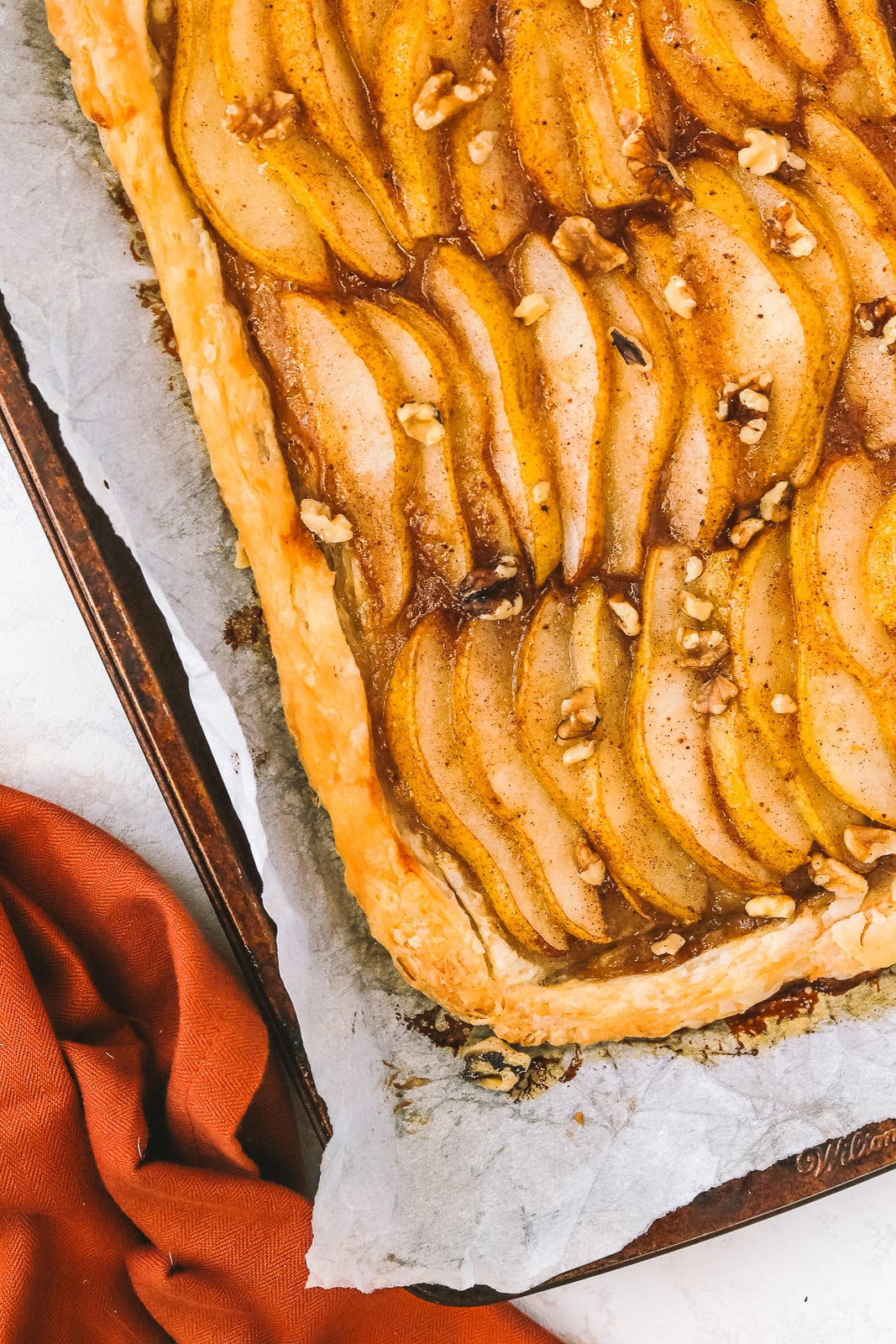 close up baked tart with pears