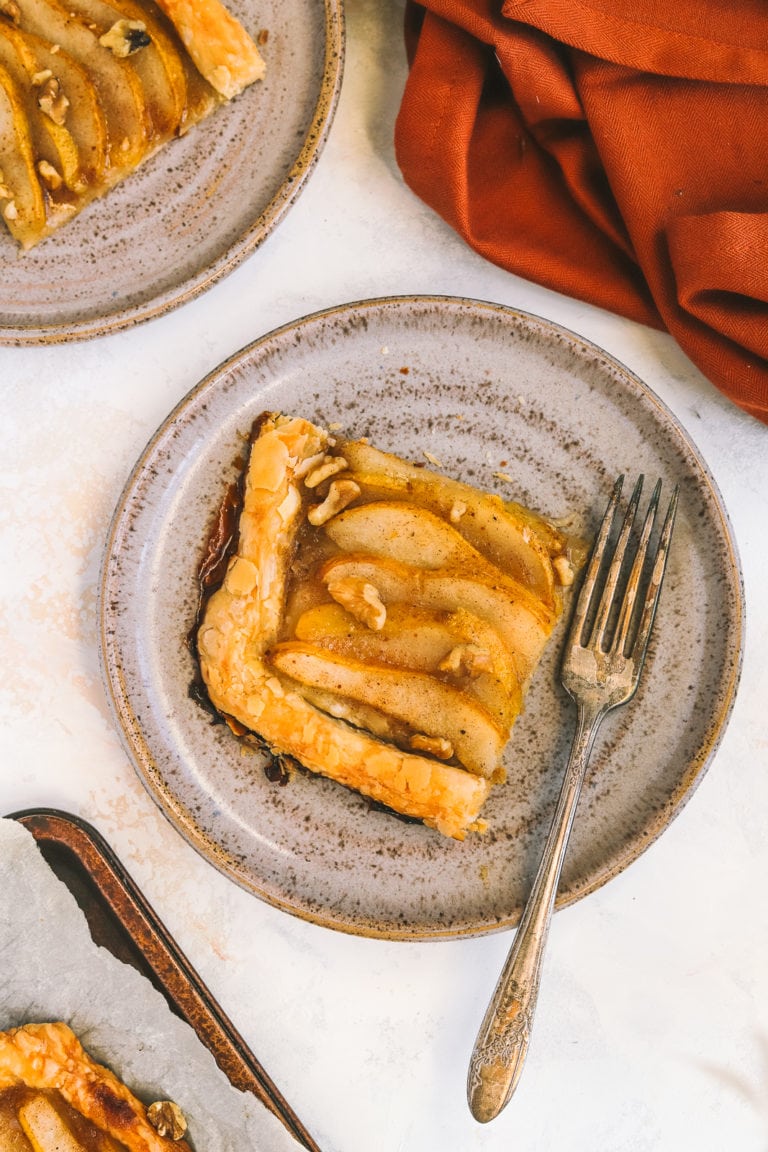 a piece of pear tart on a plate