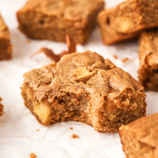 side angle of bite shot of apple pie blondie