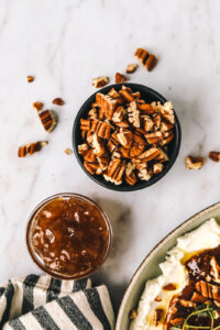pecans and fig jam in goat cheese dip