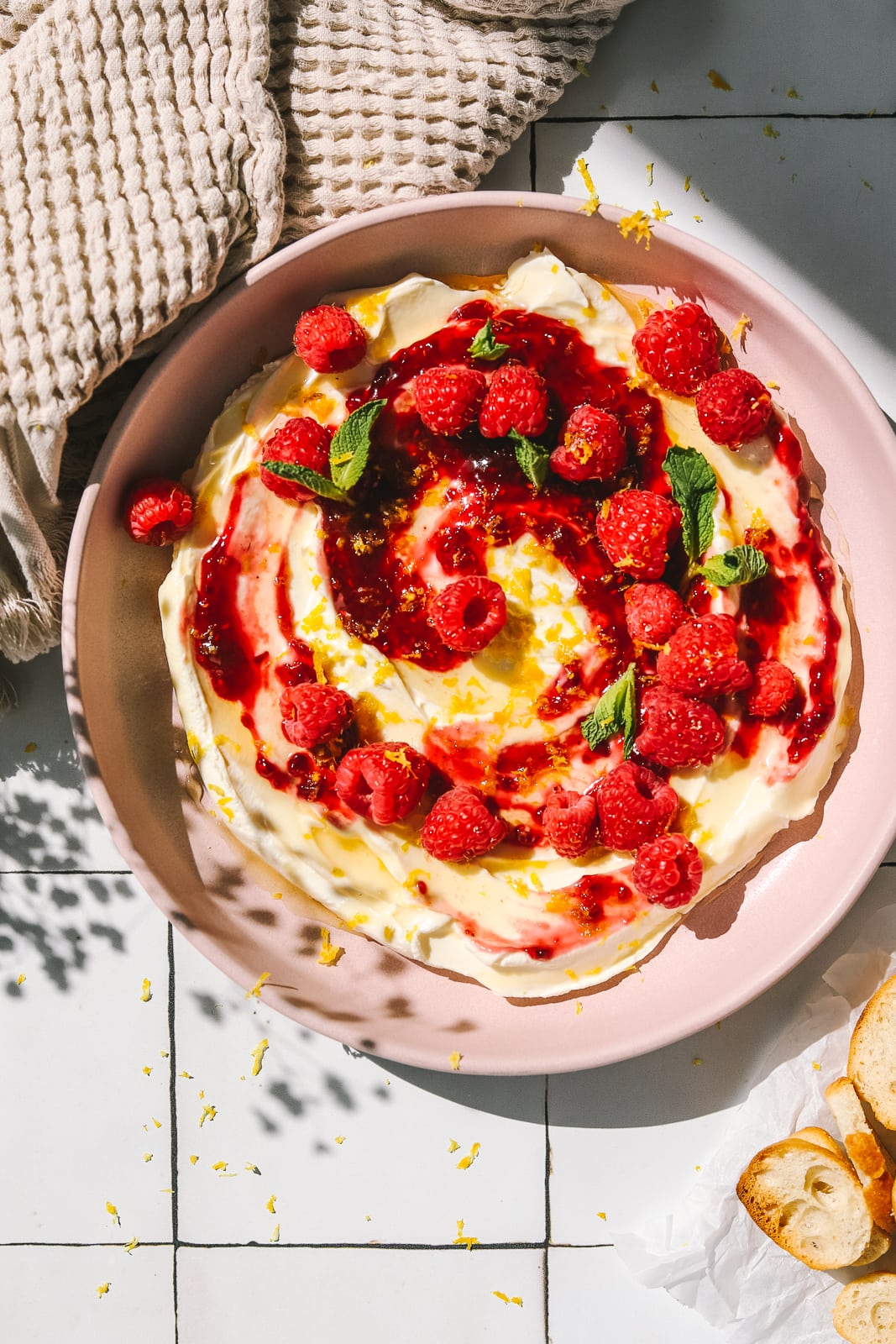 raspberries & lemon on top of cream cheese dip