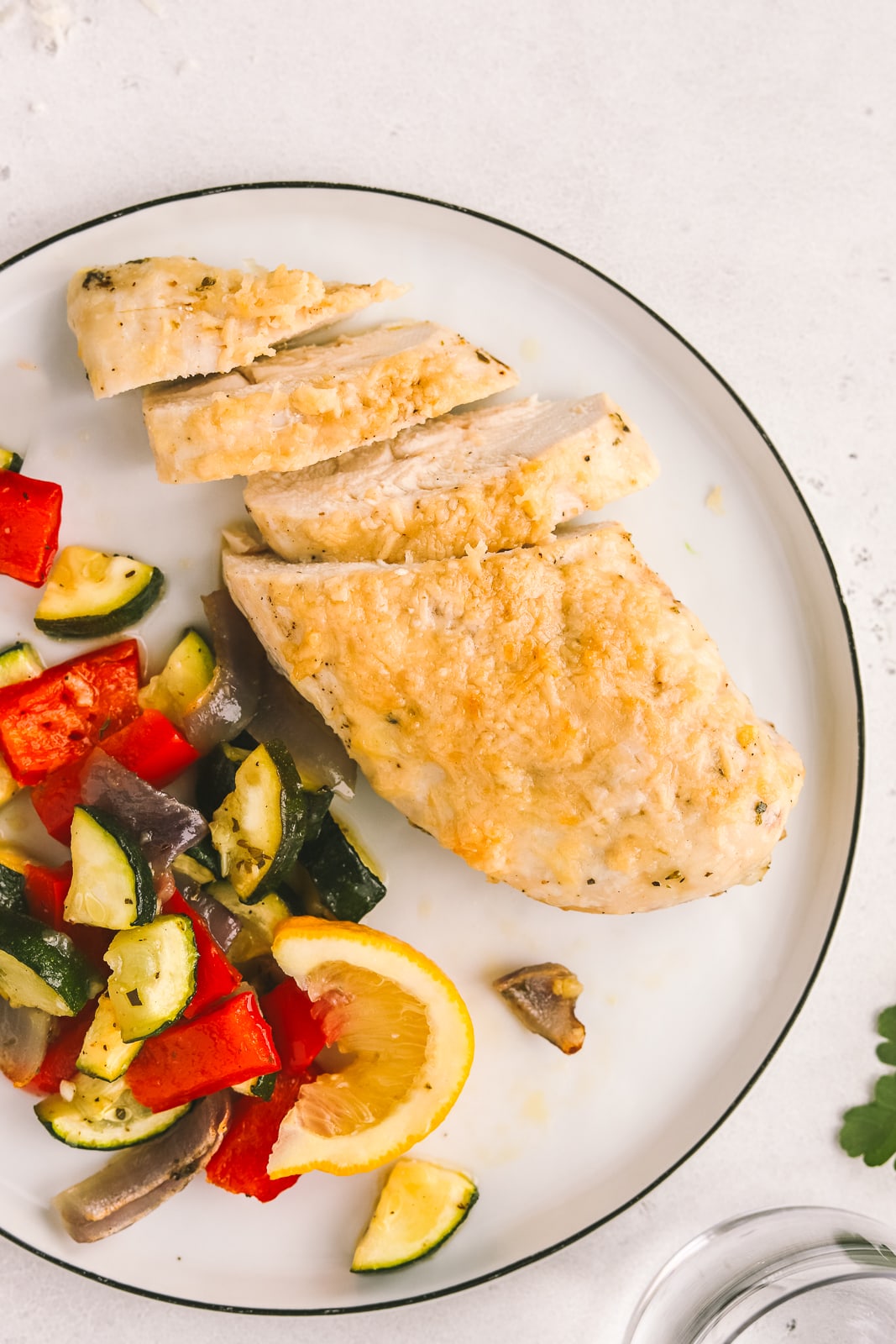 vegetables and chicken on a dinner plate