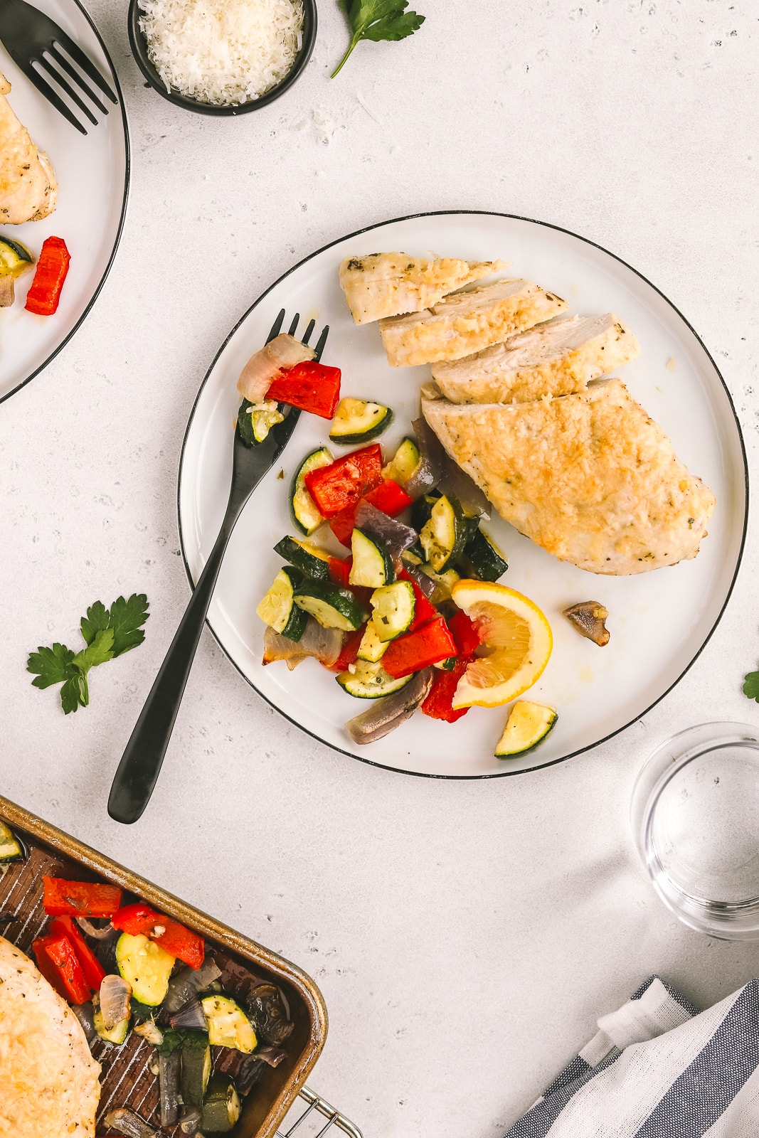 vegetables and chicken on a dinner plate