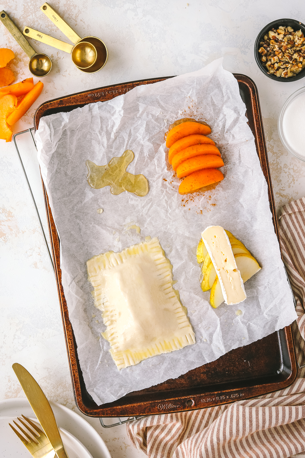 sheet pan with ingredients for the puff pastry dessert