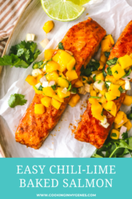 chili lime baked salmon topped with mango salsa on a plate