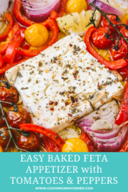 side angle of baked feta in a pan with summer vegetables