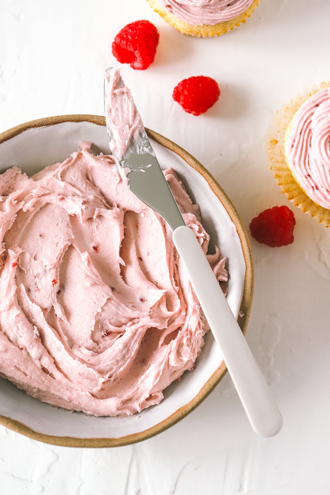 bowl of raspberry cream cheese frosting