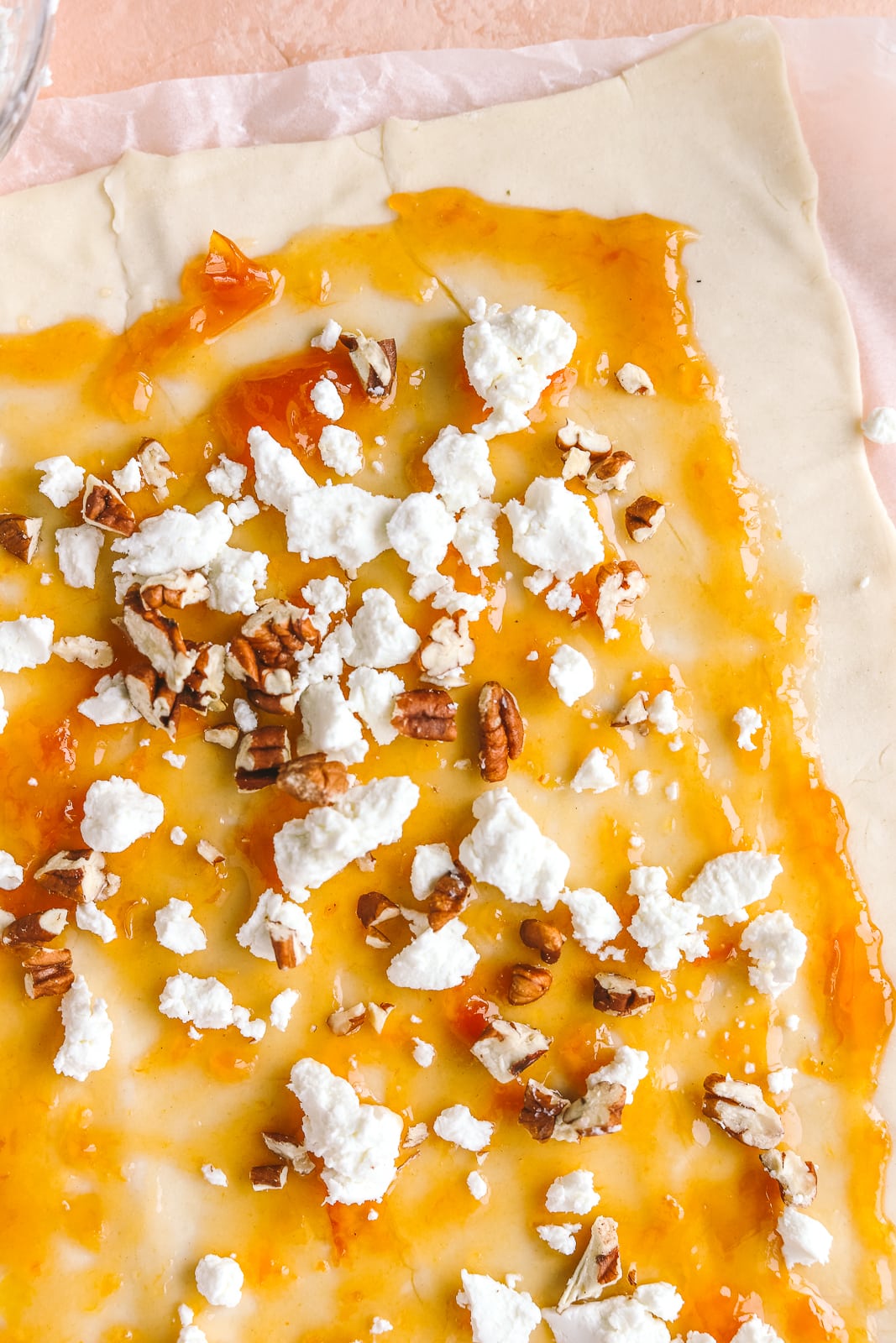 puff pastry topped with goat cheese, apricot jam and pecans