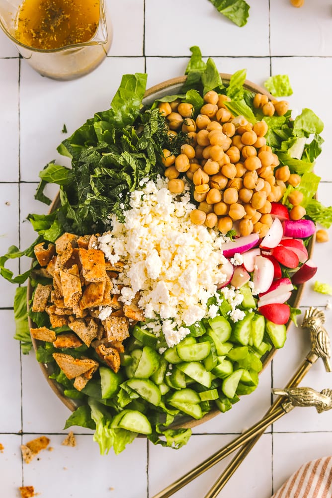 close-up of a green summer chopped salad on a serving platter