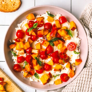 peaches and tomatoes with goat cheese served on crostini