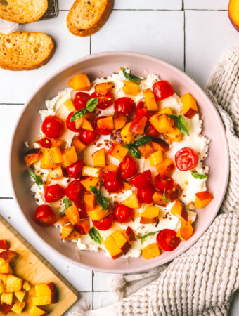 peaches and tomatoes with goat cheese served on crostini