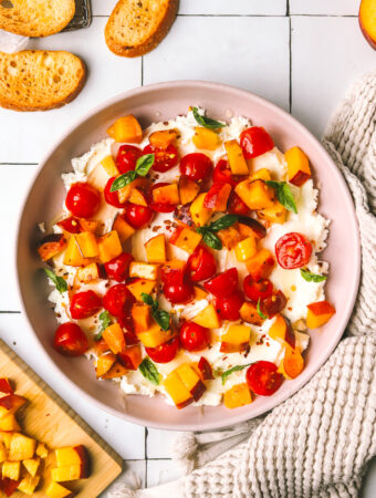 peaches and tomatoes with goat cheese served on crostini