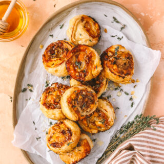 plate of closeup of a goat cheese and apricot jam pinwheel appetizers