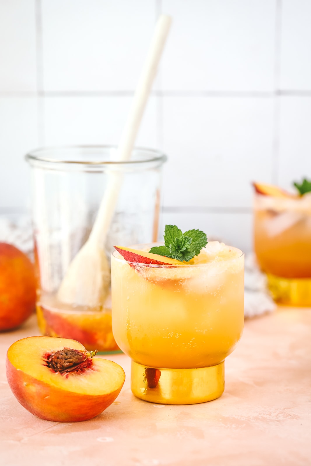 peach whiskey cocktail in a cocktail glass