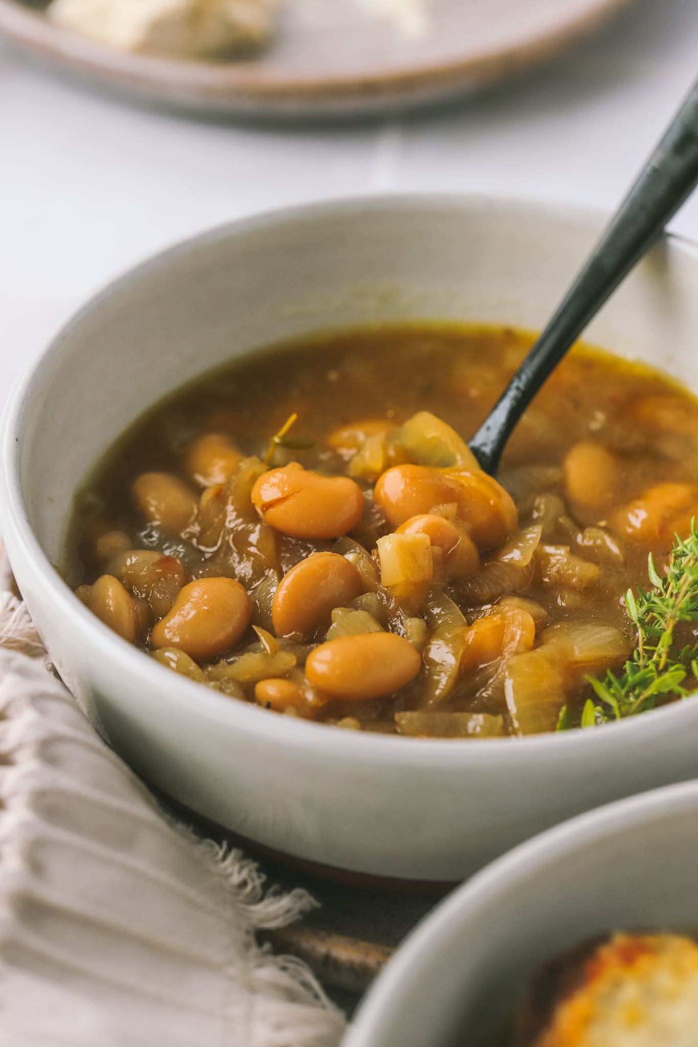 side view of bean soup in a bowl