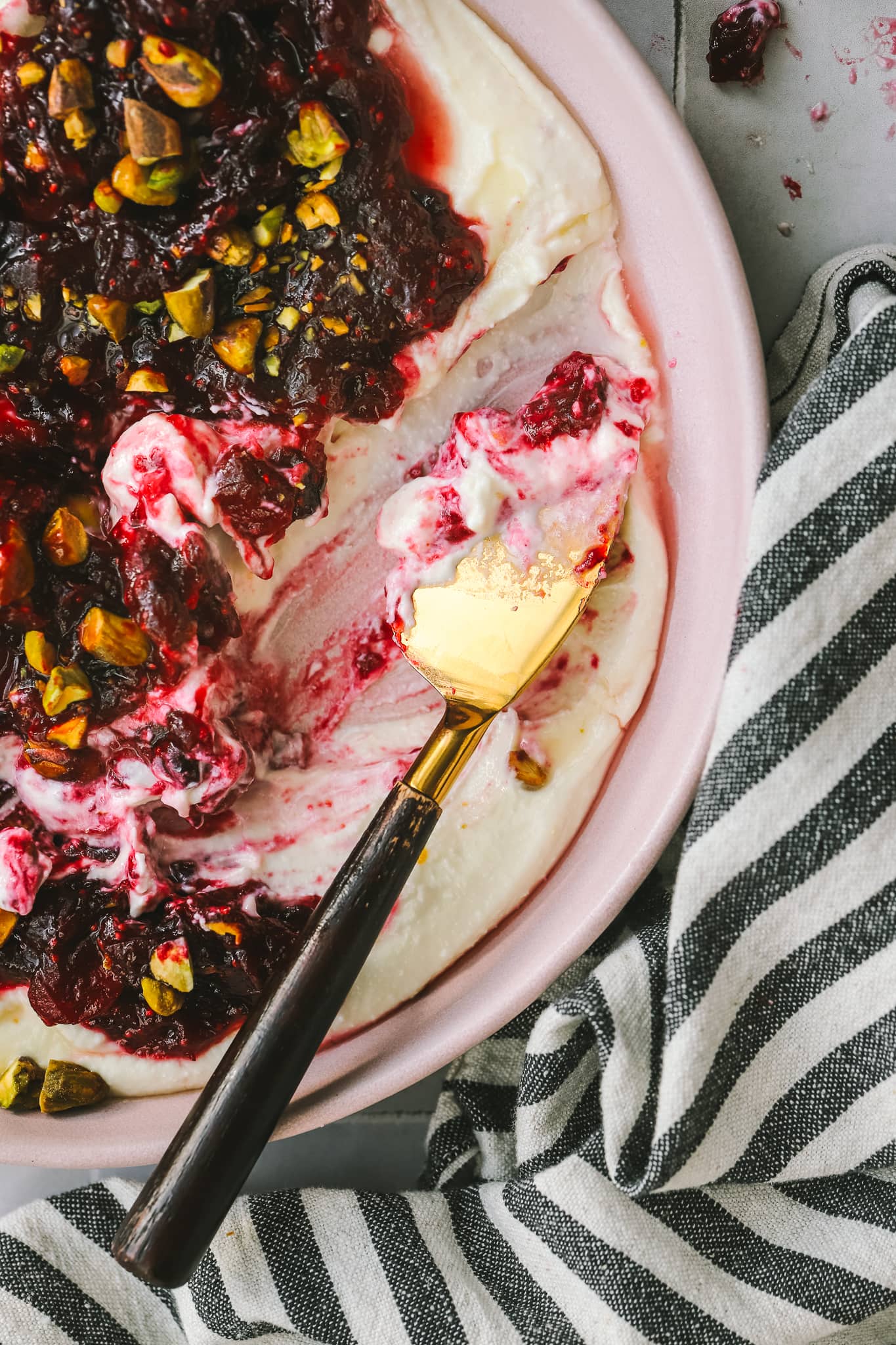 knife dipped into whipped feta