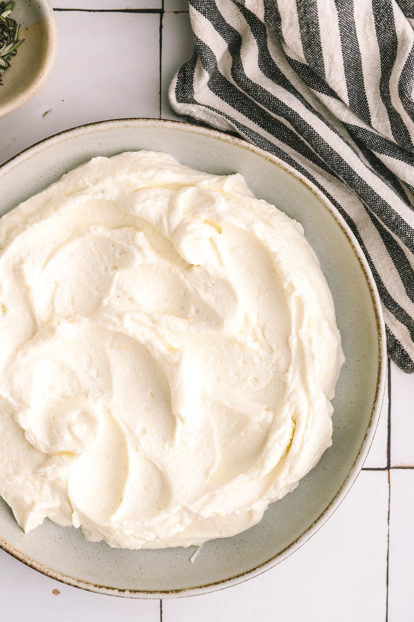 whipped ricotta in a bowl overhead shot