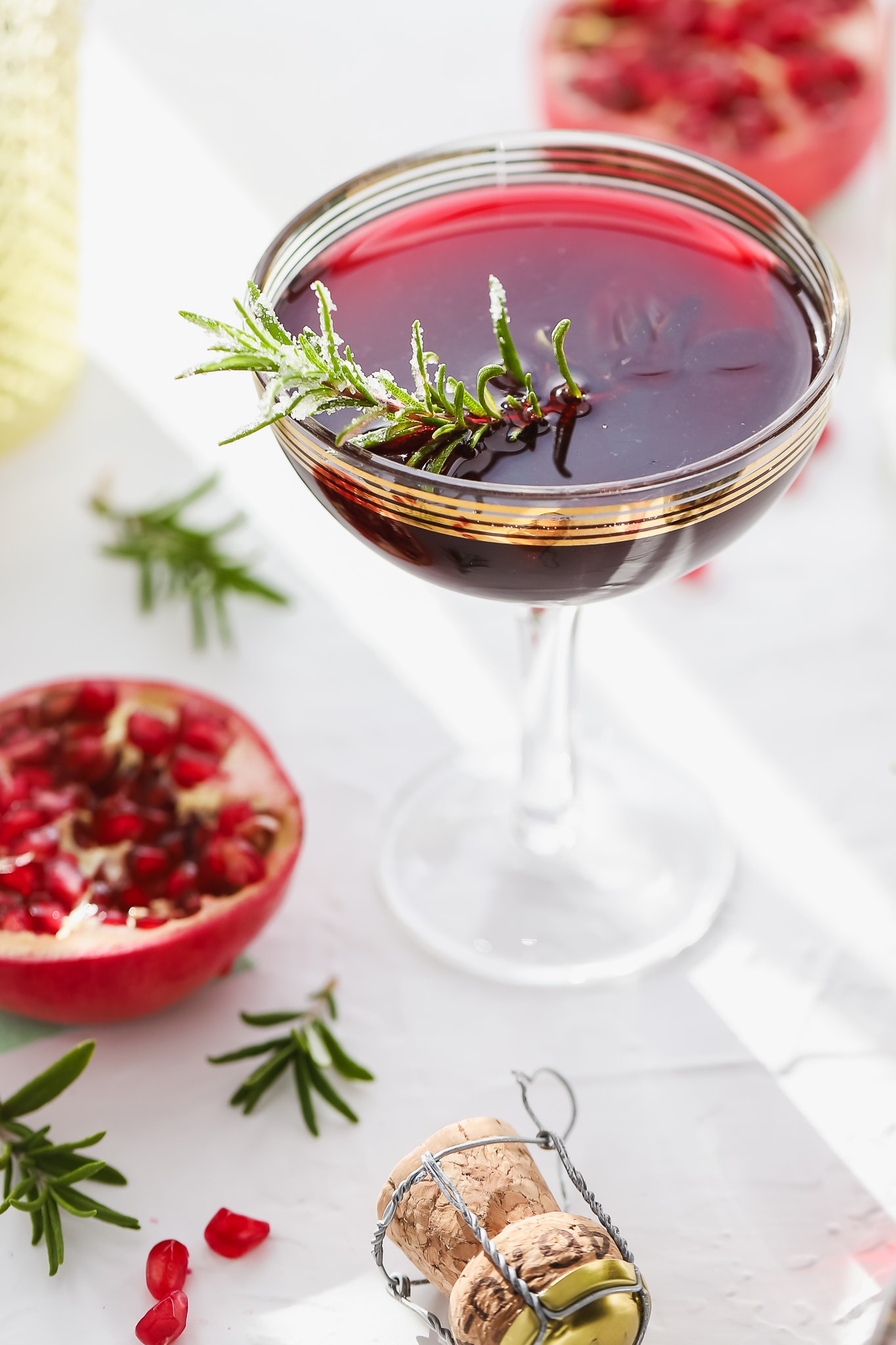 angled photo of pomegranate vodka cocktail