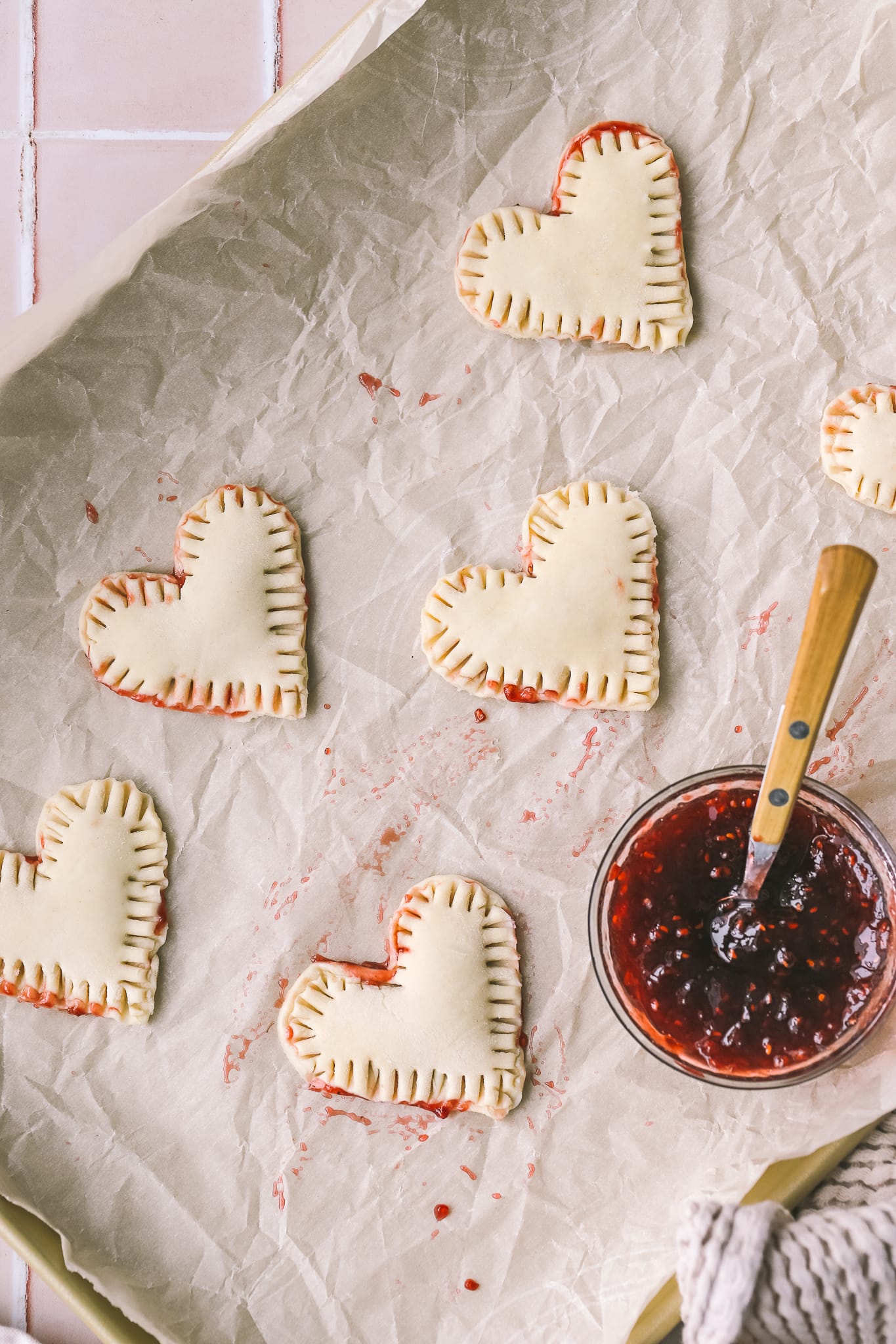 raspberry jam filled puff pastry heart pies uncooked