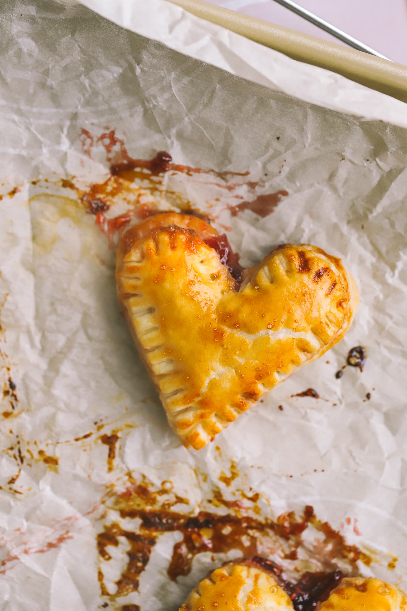 closeup of a baked puff pastry heart pie