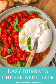roasted tomatoes in a bowl with burrata cheese and toasted bread