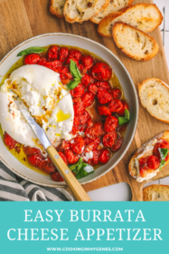 roasted tomatoes in a bowl with burrata cheese and toasted bread