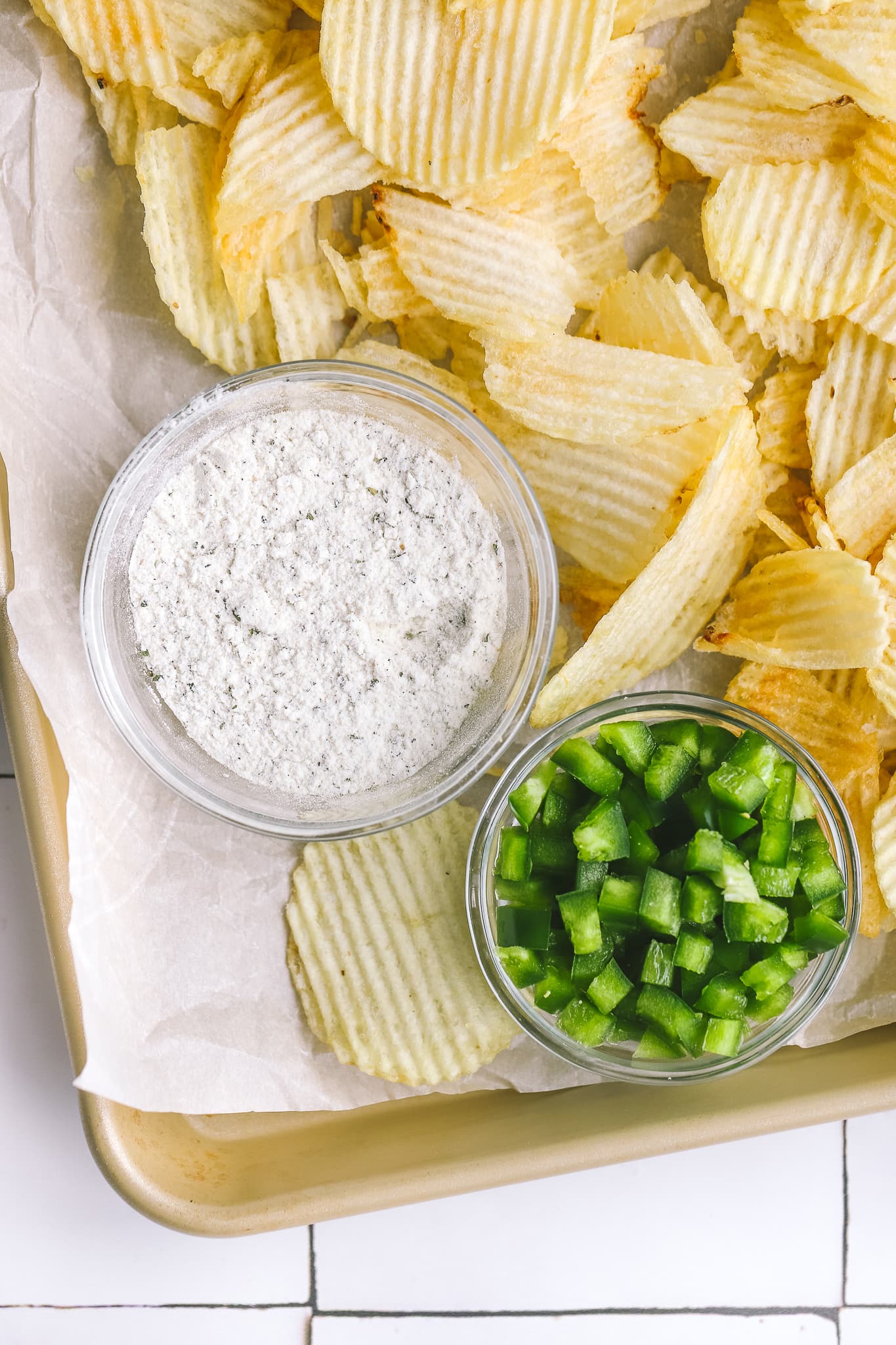 bowl of ranch dip and bowl of diced jalapenos