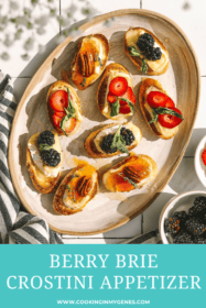 berries and brie on crostini on a platter