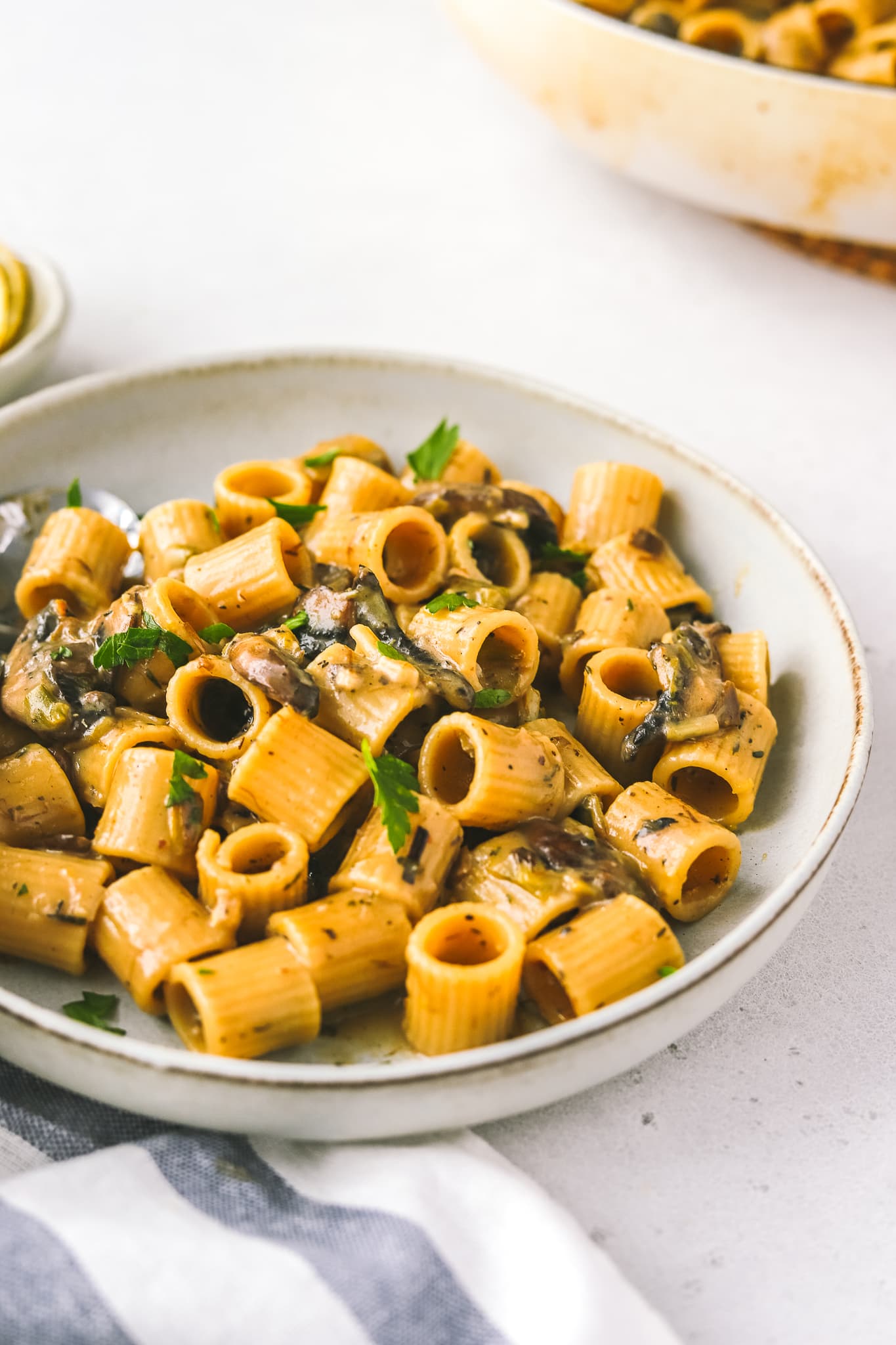 angled shot of mushroom leek pasta in a bowl