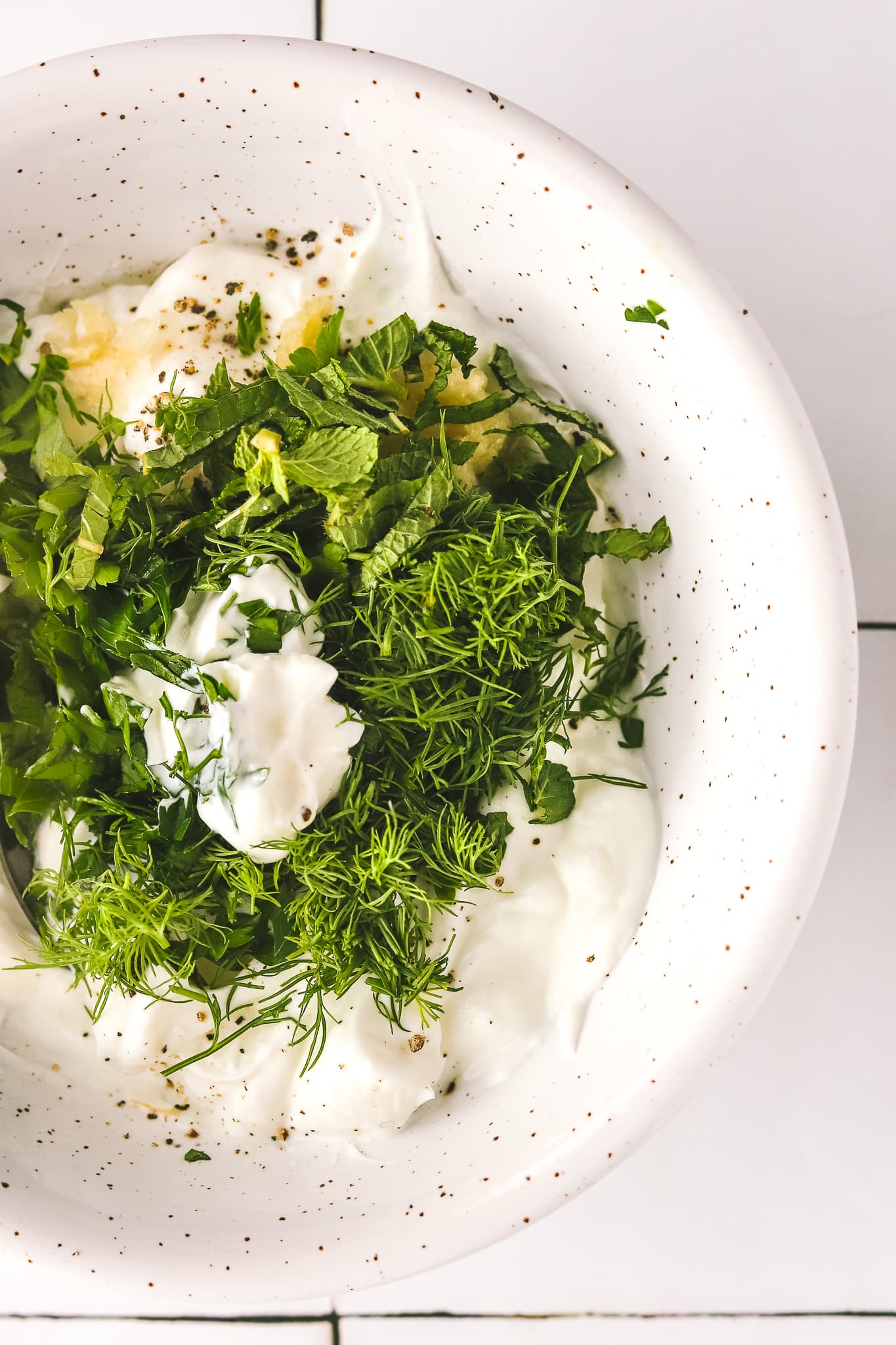 herby yogurt sauce in a bowl