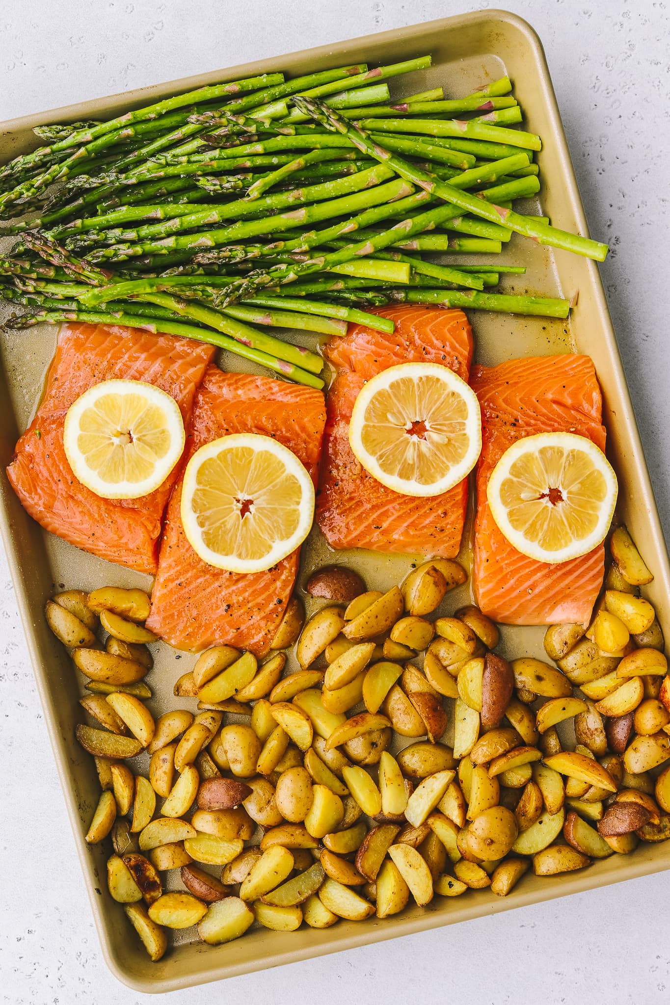 one pan Spring salmon with asparagus and potatoes on a sheet pan