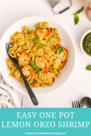 white bowl with orzo, cooked shrimp and side of pesto