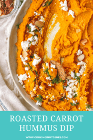 carrot hummus spread in a low bowl with toppings
