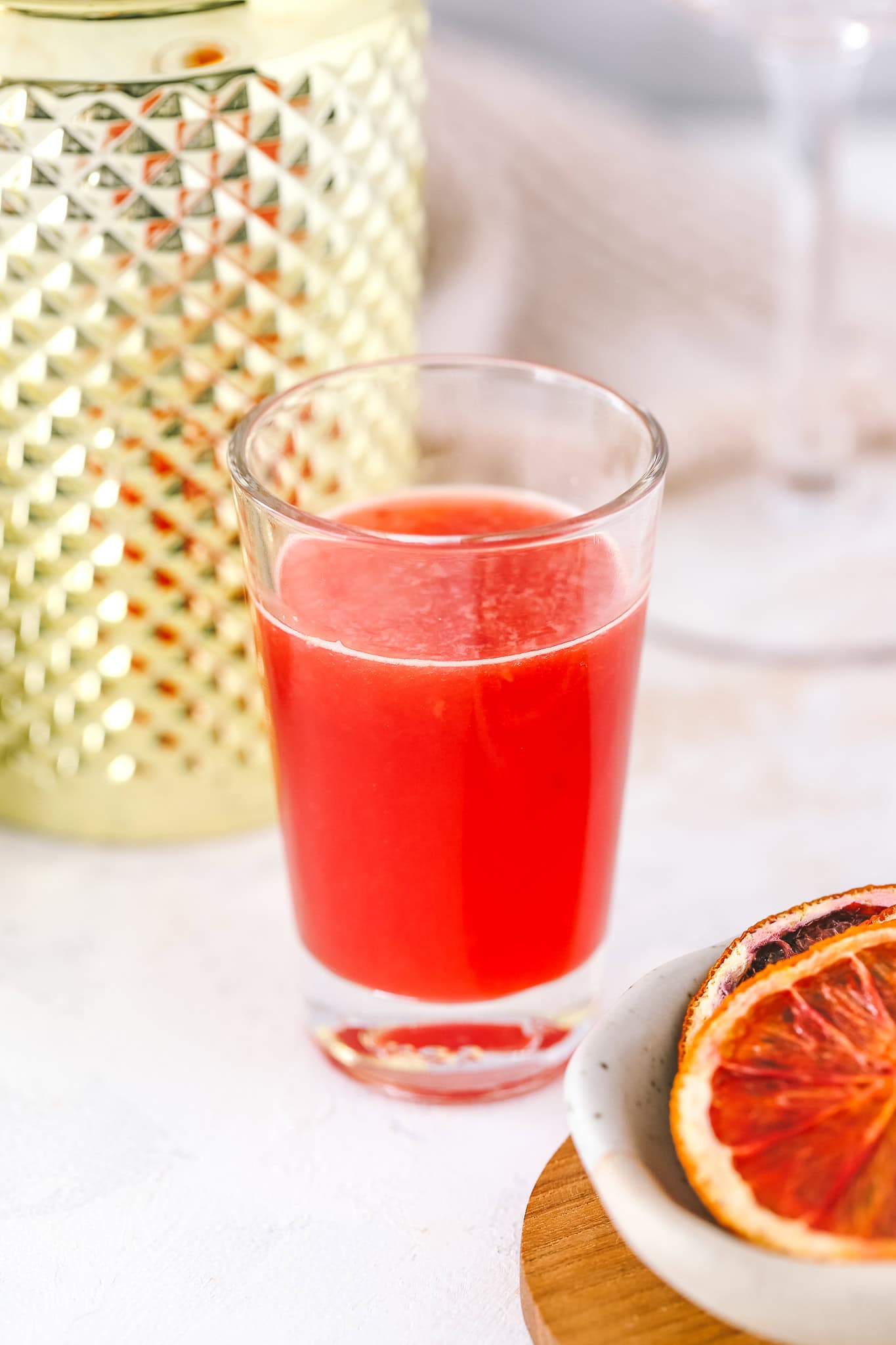 blood orange juice in a shot glass