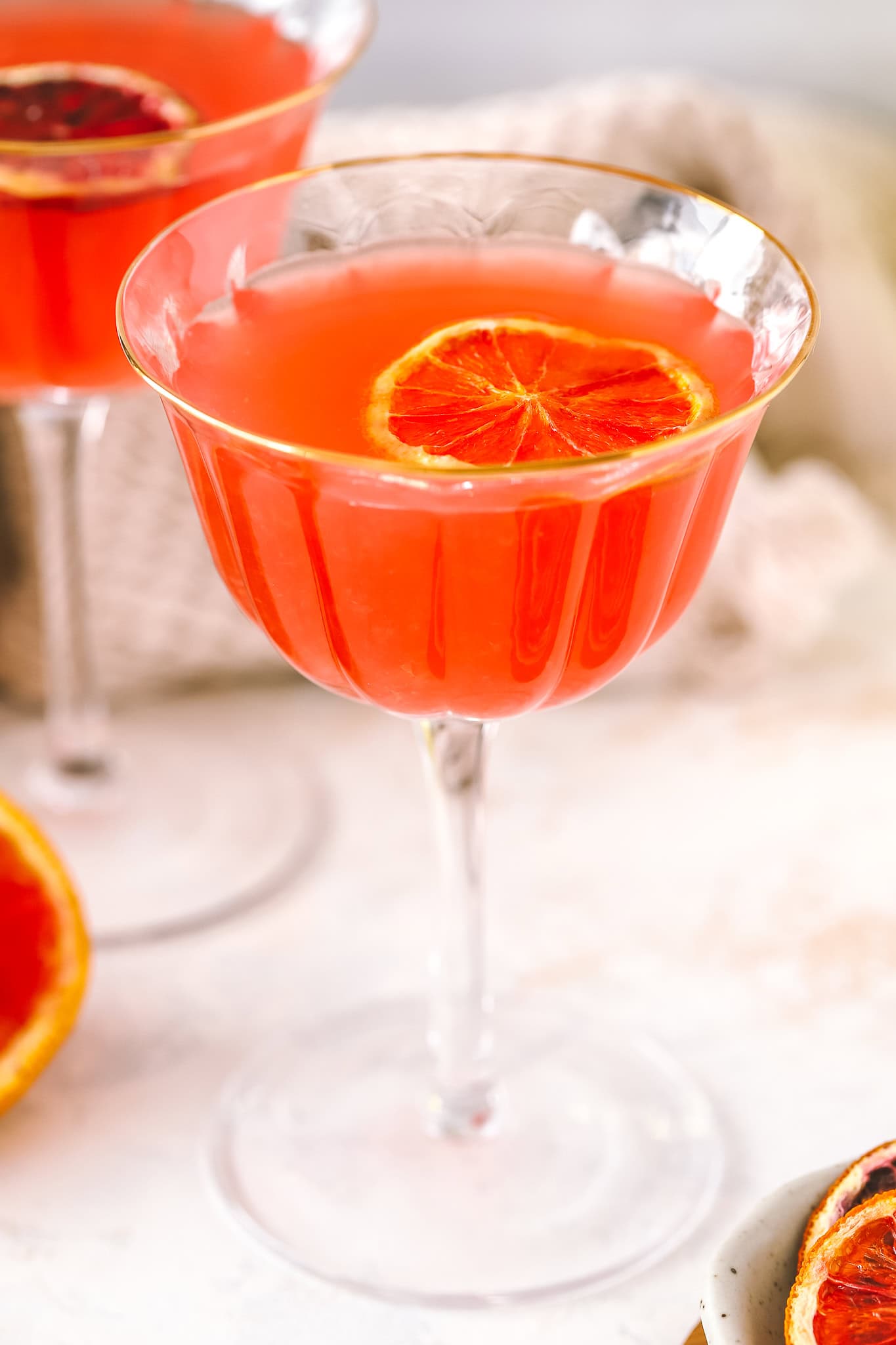 two glasses of blood orange martini