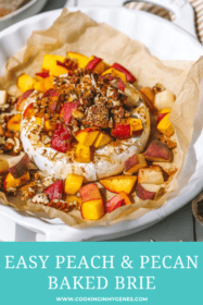 angled shot of peach baked brie in a baking dish