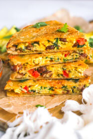 stack of egg quesadillas with pinto beans
