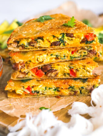 stack of egg quesadillas with pinto beans