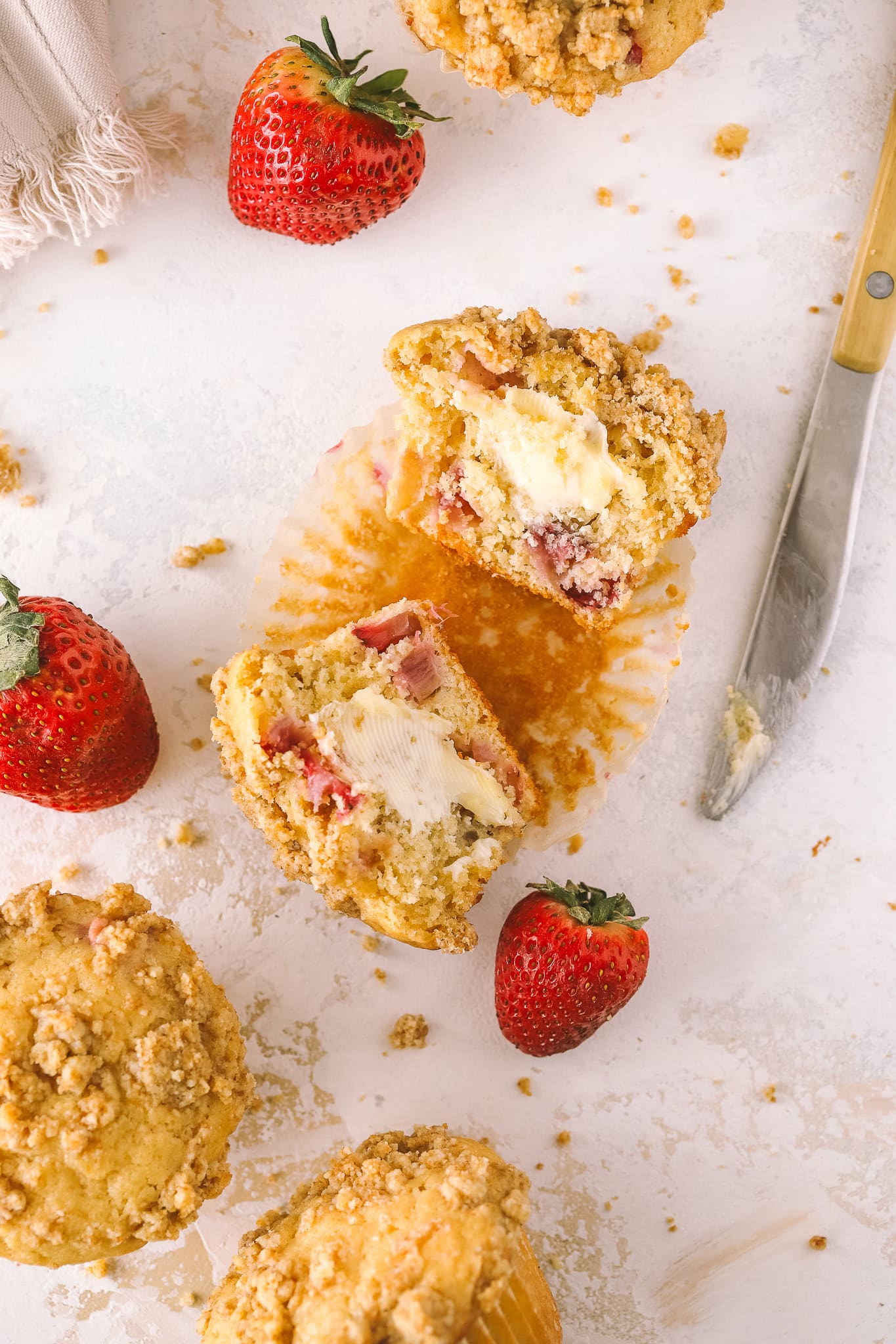 sliced strawberry muffin with butter