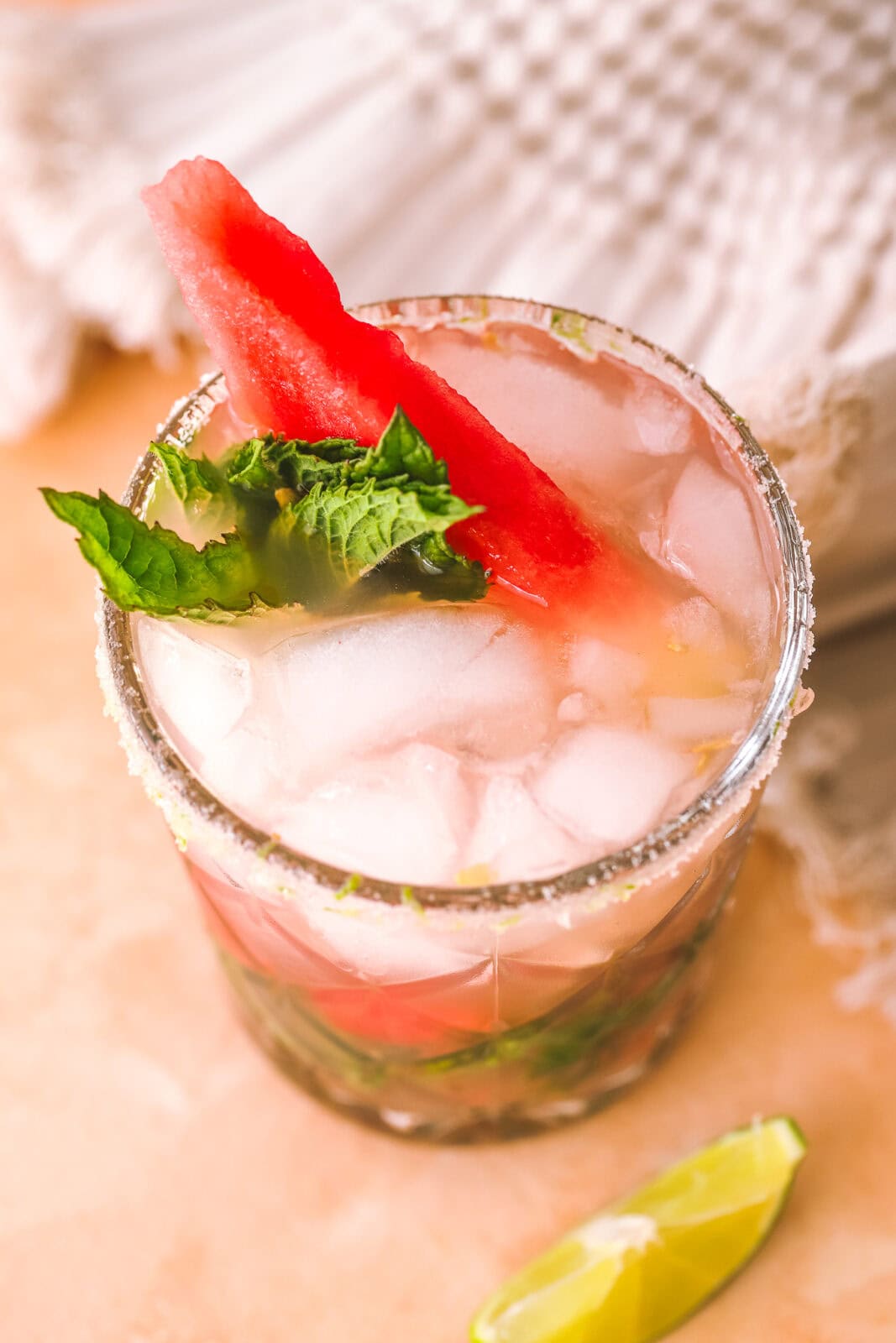 overhead shot of mojito with watermelon garnish