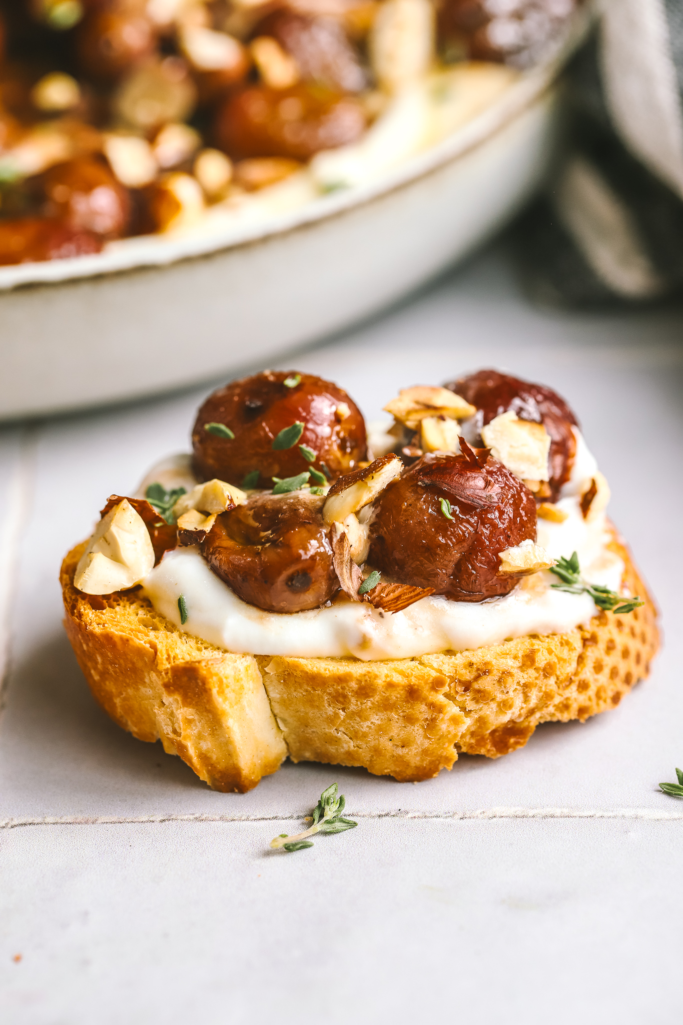 whipped ricotta on toast with roasted grapes