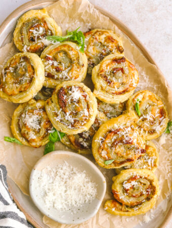 tray full of pesto pinwheels