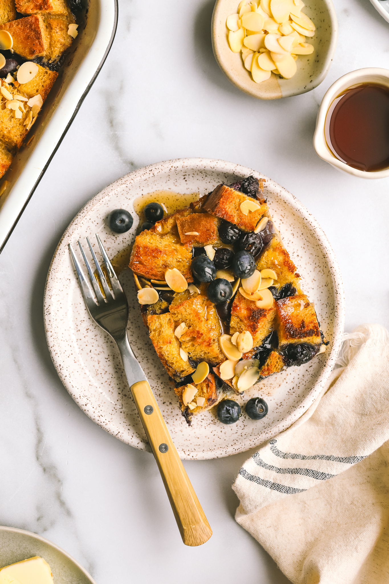 piece of baked blueberry french toast on a plate
