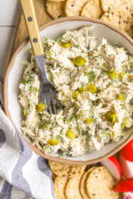 spoon in a bowl of chicken salad