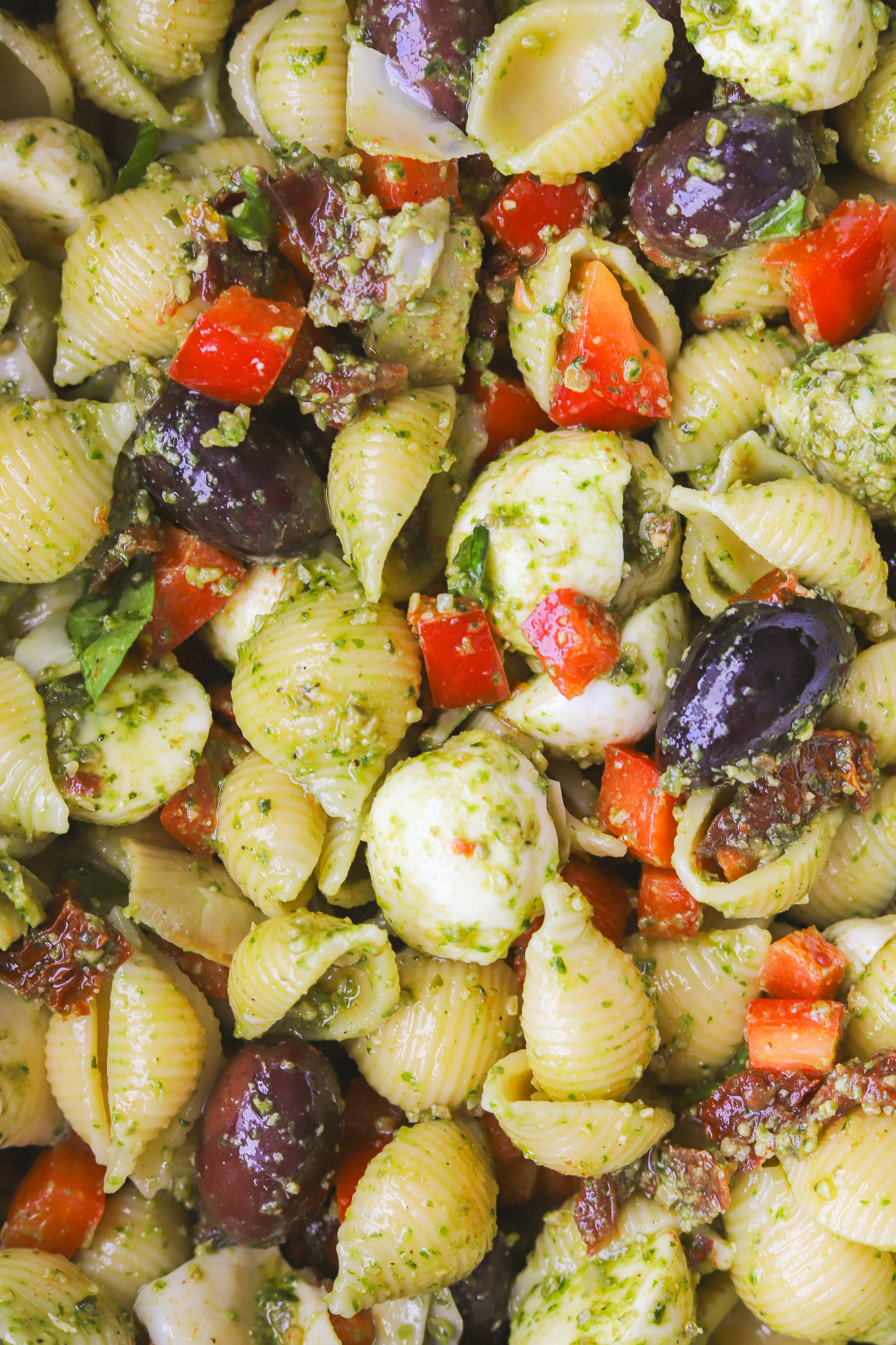 close up of pesto pasta salad